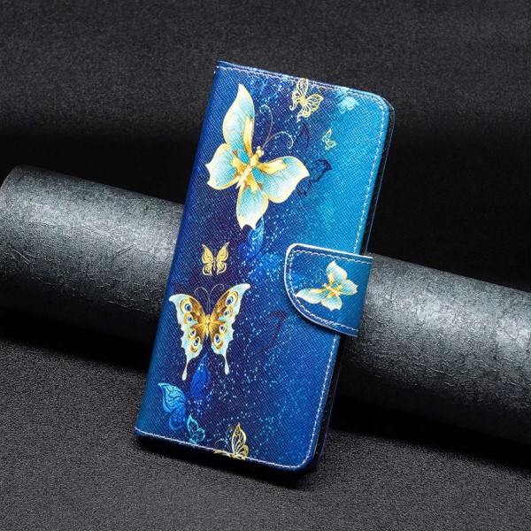 Pouzdro na iPhone 14 Pro Max Motýl modré